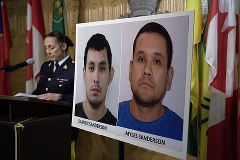 Assistant Commissioner Rhonda Blackmore speaks next to images of Damien Sanderson and Myles Sanderson during a press conference (Photo | AP)