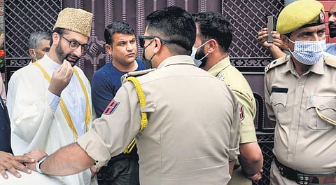Mirwaiz Umar Farooq tries to leave his house in Srinagar on August 26,2022. | Zahoor Punjabi