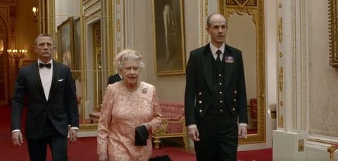 Queen Elizabeth II alongside Daniel Craig as James Bond.