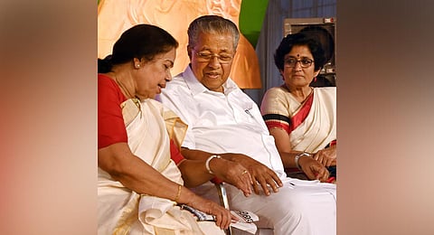 Pinarayi Vijayan having a chat with senior CPM leader and newly-elected president of AIDWA P K Sreemathy,  AIDWA general secretary Mariam Dhawale is also seen.(Photo | Vincent Pulickal, EPS)