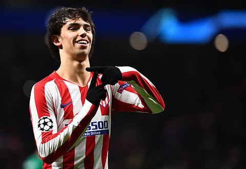 In this file photo taken on December 11, 2019 Atletico Madrid's Portuguese forward Joao Felix celebrates after scoring the opening goal during the UEFA Champions League football match. (Photo | AFP)