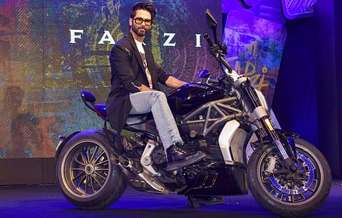 Bollywood actor Shahid Kapoor poses for photographs during the trailer launch of web series 'Farzi' on Amazon Prime Video, in Mumbai. (Photo | PTI)