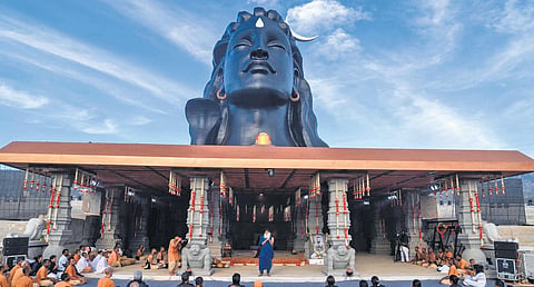 Sadhguru Jaggi Vasudev addresses the gathering during the unveiling of the 112-ft-tall Adiyogi statue in Avalagurki village, near Chikkaballapur on Sunday | Express
