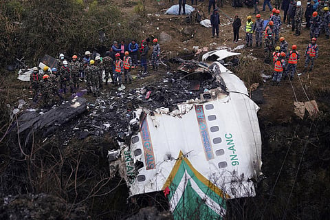 At least 69 people were confirmed dead when a plane with 72 on board crashed into a river gorge in Nepal while landing at the newly-opened airport in the resort city of Pokhara (Photo | AP)