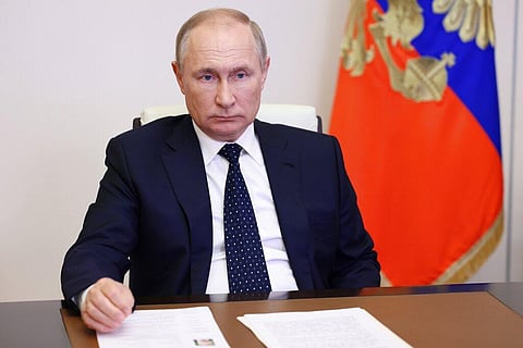 Russian President Vladimir Putin listens during a videoconference at the Novo-Ogaryovo state residence, outside Moscow, Russia, Monday, Jan. 16, 2023. (Photo | AP)