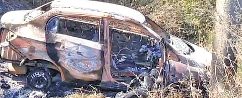 The remains of the car used for staging Dharma’s (inset)  death in Medak district