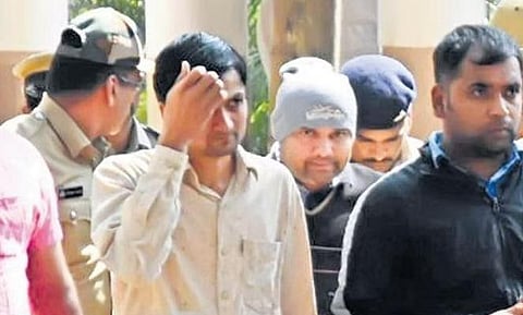 'Santro Ravi (wearing skull cap).