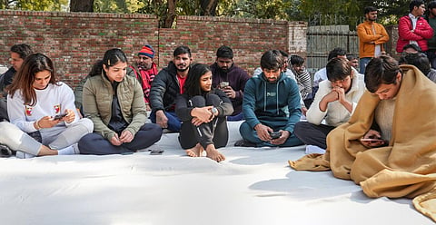 Indian wrestlers Bajrang Punia, Sakshi Malik, Vinesh Phogat, and Anshu Malik stage a strike against the Wrestling Federation of India (WFI), in New Delhi. (Photo | PTI)