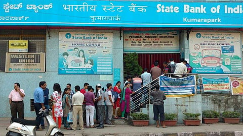 People waiting outside a bank to exchange old currency notes after PM Modi announced the Demonetisation on November 8, 2016. 