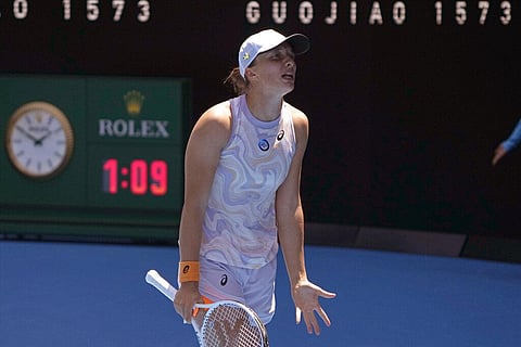 Iga Swiatek of Poland reacts as she plays against Elena Rybakina of Kazakhstan during their fourth round match at the Australian Open tennis championship in Melbourne, Australia. (Photo | AP)