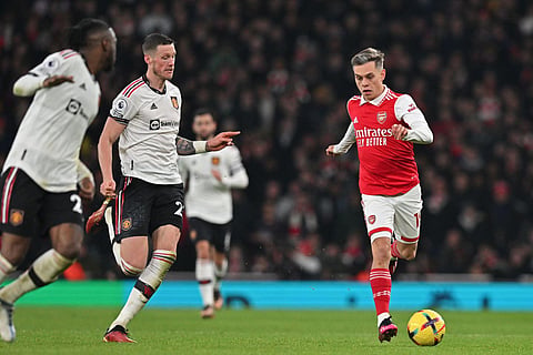 Arsenal's Belgian midfielder Leandro Trossard runs with the ball during the English Premier League football match between Arsenal and Manchester United at London's Emirates Stadium. (Photo | AFP)