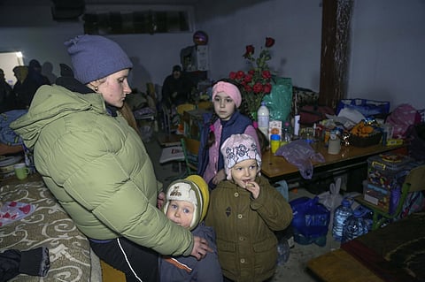 Women and children in a school bomb shelter in Ukraine. (File Photo | AP)