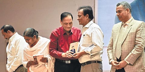 Dr Samaram releasing the autobiography of former CS K Madhava Rao at Tummalapalli Kalashetram in Vijayawada on Tuesday I Prasant Madugula