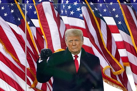 Former US President Donald Trump gestures as he arrives to speak at a rally on Jan. 6, 2021, in Washington. (File Photo | AP)