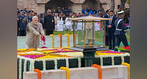Prime Minister Narendra Modi pays tribute to Mahatma Gandhi at Rajghat on the occasion of Martyrs' Day, observed to mark the death anniversary of the father of the nation (Photo | PTI)