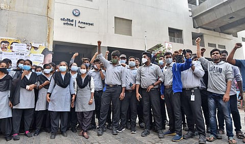 Contract employees of Hyderabad Metro Train Limited stage a protest at the Ameerpet Metro Station in Hyderabad. (Photo  | Jwala)