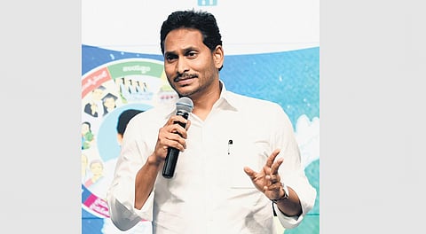 Chief Minister YS Jagan Mohan Reddy interacts with the YSRC rank and file of Vijayawada East Constituency at his camp office in Tadepalli on Wednesday I Express
