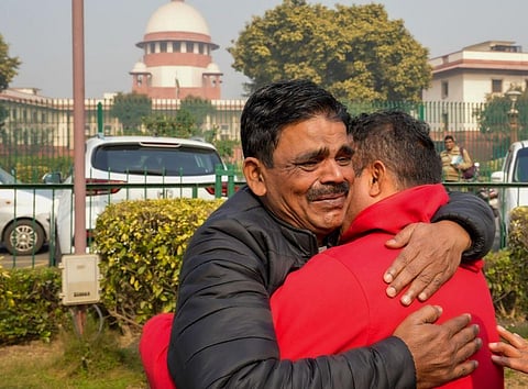 Local people from Haldwani react as they celebrate the Supreme Court's order on Haldwani eviction case, in New Delhi. (Photo | PTI)