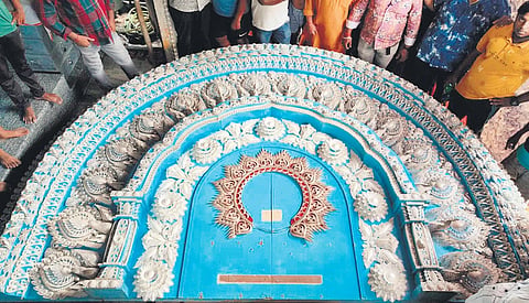 The silver backdrop of the idol of Kafla Bazaar puja committee in the making at Cuttack | Express
