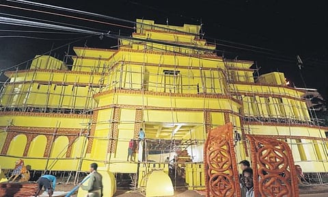 Work in progress at the Nayapalli Durga Puja pandal in Bhubaneswar on Tuesday | SHAMIM QURESHY