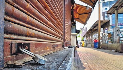A section of shops was shut at Central Bus Stand in support of bandh called by farmers in Tiruchy on Wednesday  | MK Ashok Kumar