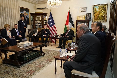 Palestinian President Mahmoud Abbas (R)and US Secretary of State Antony Blinken sit for their meeting in Amman, Jordan, Friday, Oct. 13, 2023. (Photo | AP)