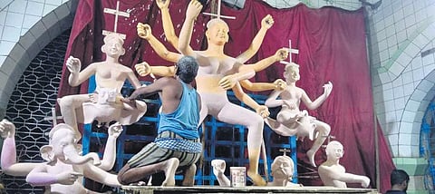An artist working on the idol of Goddess Durga at Chandni Chowk | Express