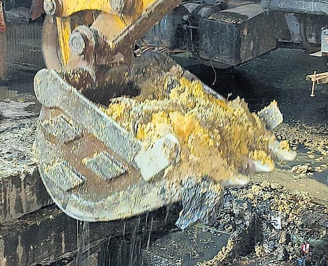 PWD removing food waste from drains