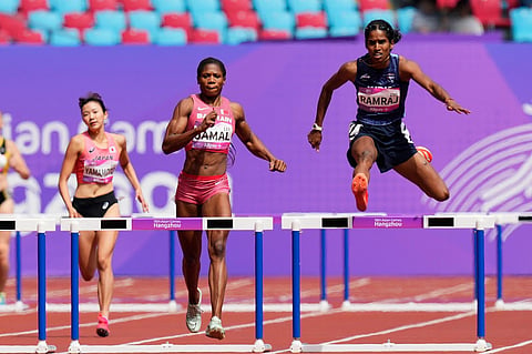 India's Vithya Ramraj during the women's 400-meter hurdles heat at the 19th Asian Games in Hangzhou, China on Monday, October 2, 2023. (Photo | PTI)