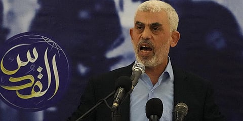 Yahya Sinwar, head of Hamas in Gaza, delivers a speech during a meeting with people at a hall on the sea side of Gaza City, April 30, 2022. (Photo | AP)