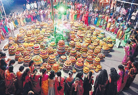 Devotees celebrate Saddula Bathukamma in Karimnagar on Sunday