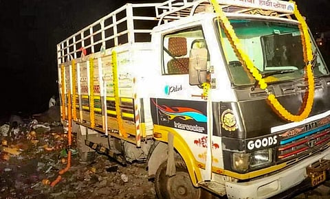 The truck crashes into a group of devotees who were carrying an idol of Goddess Durga to immerse at the Bailey Bodhanwala Ghat, in Jamshedpur, on October 24, 2023 (PTI)