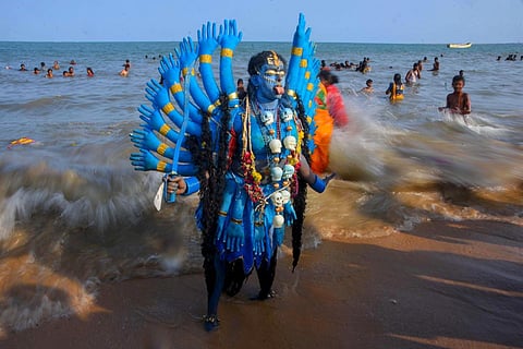 The 9-day-long festival of Navratri is celebrated in a wide range of ways across the country. IN PIC: A devotee dressed up as a deity for the Kulasekarapattinam Mutharamman Temple festival in Tirunelveli. (Photo | V Karthikalagu)