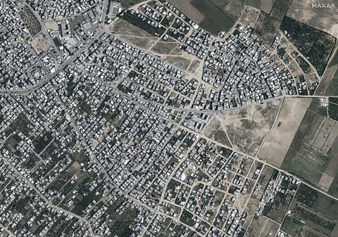 Maxar Technologies shows before bombing at the Beit Hanoun neighborhood, northern Gaza. (Photo | AP)
