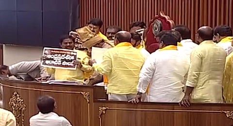 Representational Image: TDP MLAs walk up to the Well of the Assembly, protesting against the arrest of former CM and party president N Chandrababu Naidu.(Photo | Screengrab)