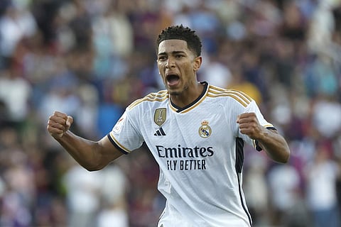 Real Madrid's Jude Bellingham celebrates after scoring his side's second goal during the La Liga soccer match between Barcelona and Real Madrid on Oct. 28, 2023. (Photo | AP)