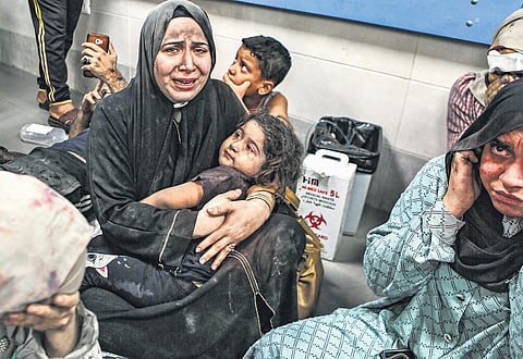 Wounded Palestinians at al-Shifa hospital in Gaza City.(Photo | AP)