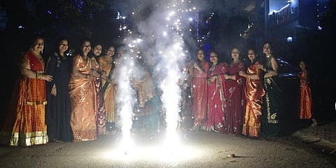 People burn firecrackers on Diwali festival, in New Delhi on Sunday night. (Photo | Parveen Negi, EPS)