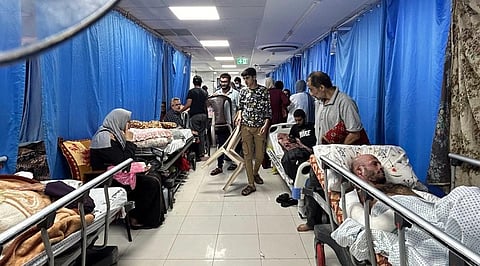 Patients and internally displaced people are pictured at Al-Shifa hospital in Gaza City on November 10, 2023. (Photo | AFP)