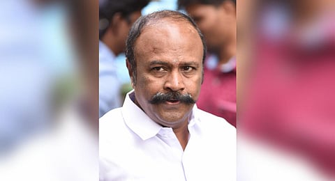 DMK leader Periyakaruppan. 