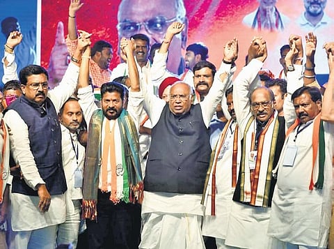AICC president Mallikarjun Kharge, TPCC president A Revanth Reddy and  other Congress leaders at a public meeting on Friday