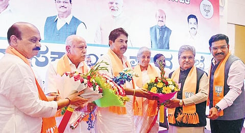 BJP leaders Basavaraj Bommai, BS Yediyurappa, Nirmala Sitharaman, Dushyant Gautam Kumar, BY Vijayendra congratulate newly appointed LoP R Ashoka, in Bengaluru on Friday. (Photo | Shashidhar Byrappa)