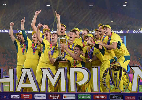 Australian players celebrate with the trophy after winning the ICC Mens Cricket World Cup 2023 finals at the Narendra Modi Stadium, in Ahmedabad, Sunday, Nov. 19, 2023. (Photo | Shiba Prasad Sahu)