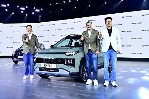 L-R: Unsoo Kim, MD & CEO, Hyundai Motor India; Tarun Garg, COO; J T Park, executive director (sales, marketing & service), at the launch of Hyundai Exter in New Delhi. (PTI)