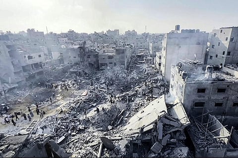 Palestinians checking the destruction in the aftermath of an Israeli strike on the Jabalia refugee camp in the Gaza Strip, on November 1, 2023. (Photo | AFP)
