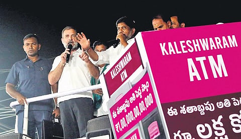 Congress leader Rahul Gandhi displays the ‘Kaleshwaram ATM’ in Shadnagar on Wednesday