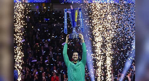 Serbia's Novak Djokovic celebrates with the trophy after winning the singles final tennis match of the ATP World Tour Finals at the Pala Alpitour, in Turin, Italy, Sunday, Nov. 19, 2023. (Photo | AP)