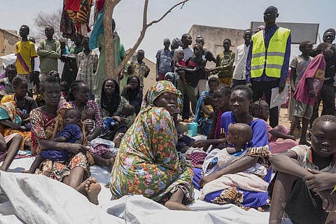 FILE - South Sudanese who fled from Sudan sit outside a nutrition clinic at a transit centre in Renk, South Sudan, on May 16, 2023. (Photo | AP)