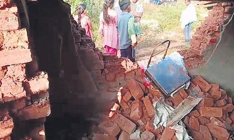 A house damaged by the elephant herd in Ladang village under Biswanathpur range of Kalahandi. (Photo | Express)