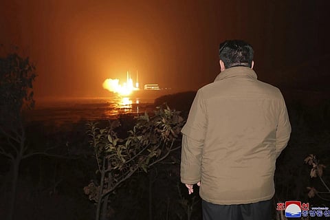 North Korean leader Kim Jong Un watches a rocket launch from a launching centre in North Korea, Tuesday, Nov 21, 2023. (Photo | AP, North Korean govt pic)